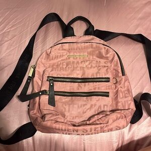 Pink Steve Madden backpack.